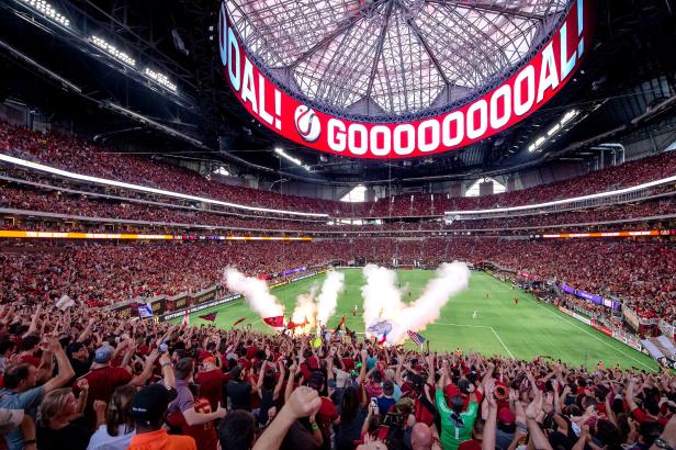 Atlanta United crowd cheering at Mercedes-Benz Stadium in Atlanta, Georgia